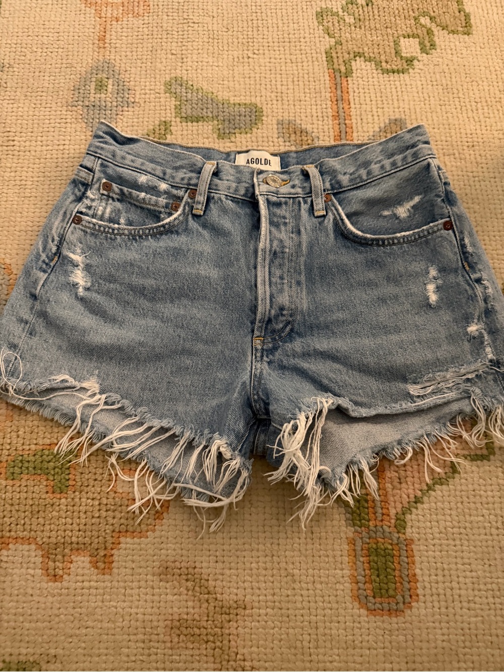 AGOLDE Washed Light Blue Distressed Denim Cutoff Shorts